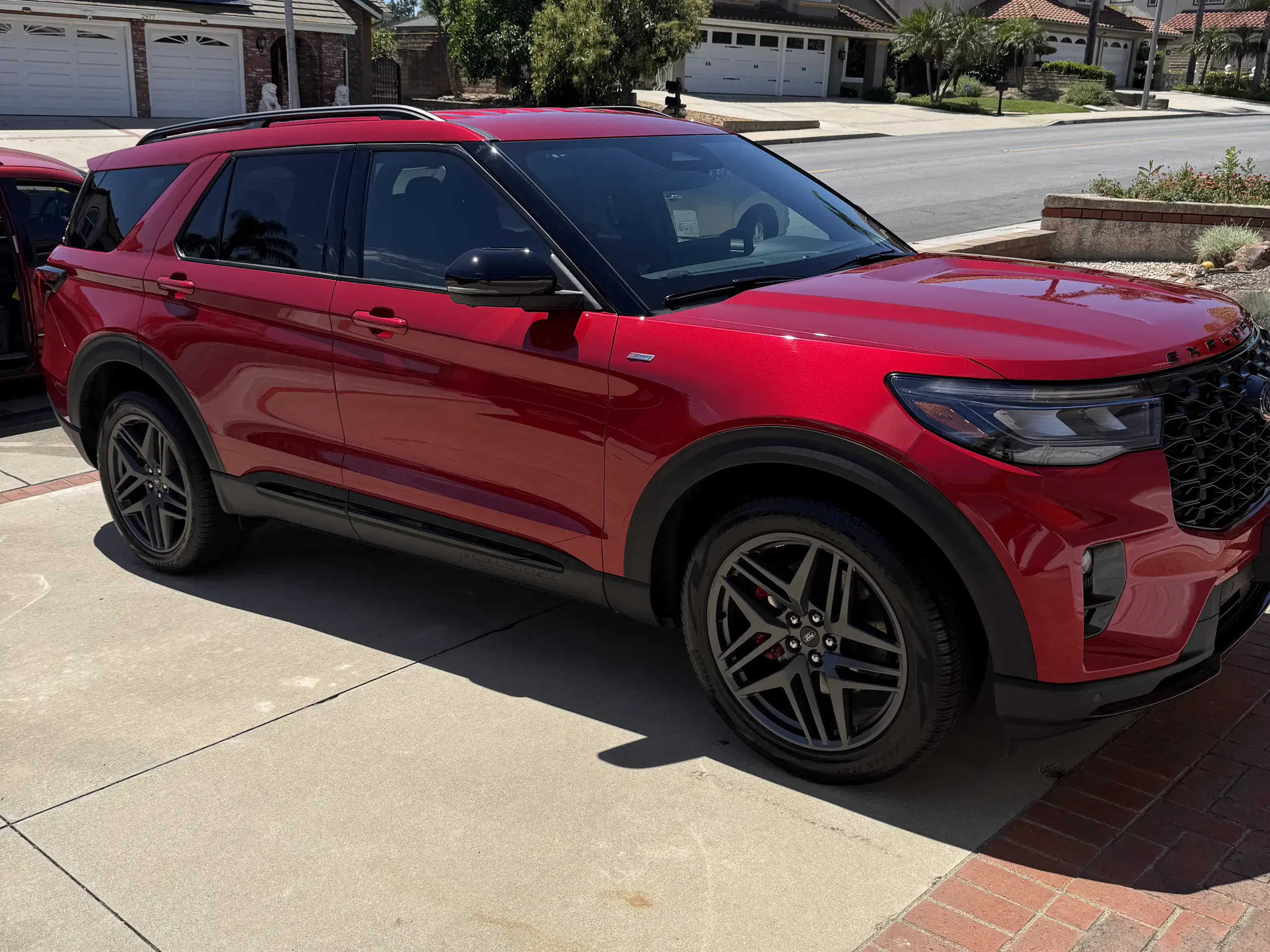 Red Ford Explorer after a five year ceramic coating by Pure Wave Auto Detailing