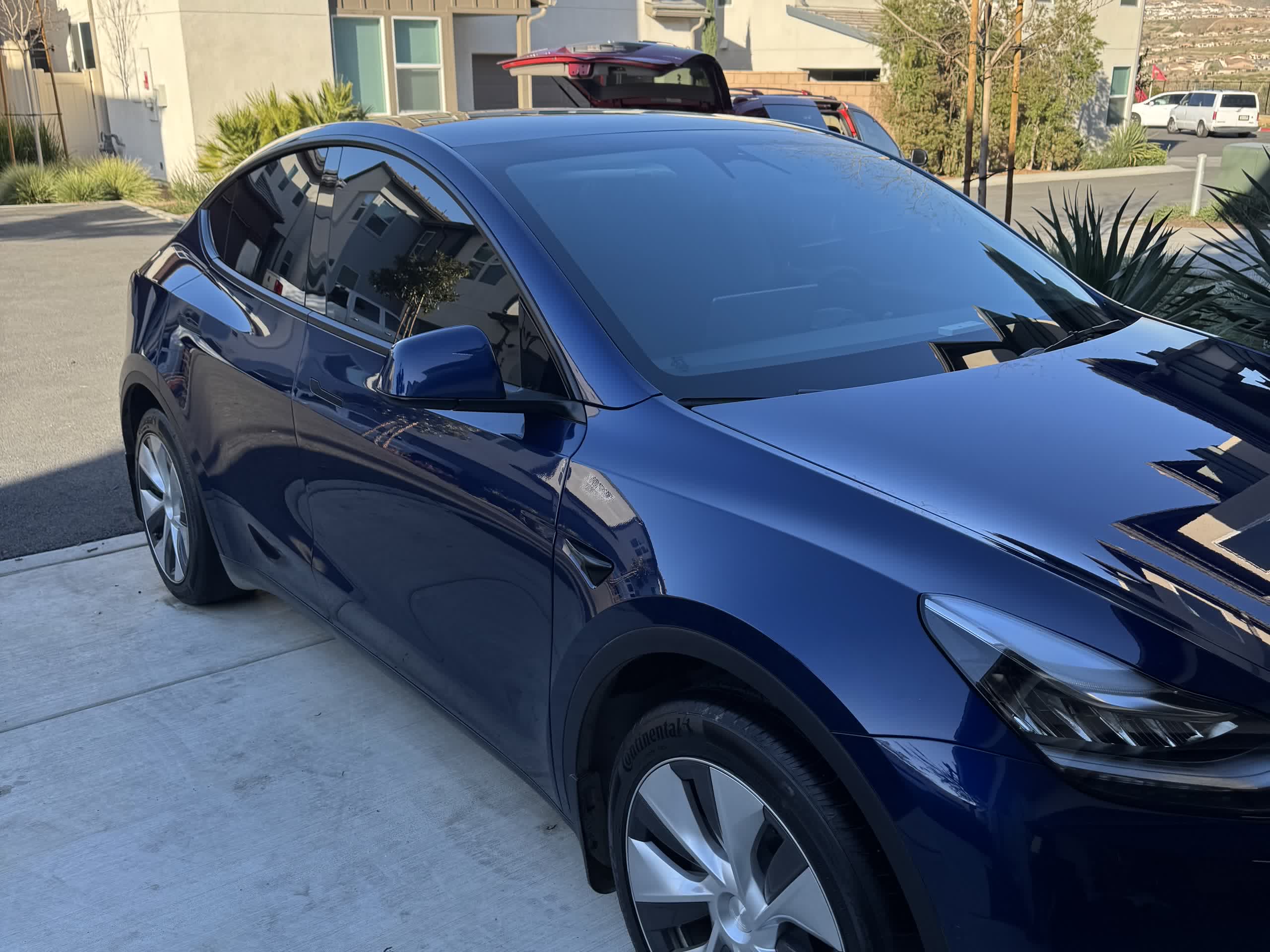 Blue Tesla Model Y with a high gloss finish after ceramic coating in Eastvale, CA