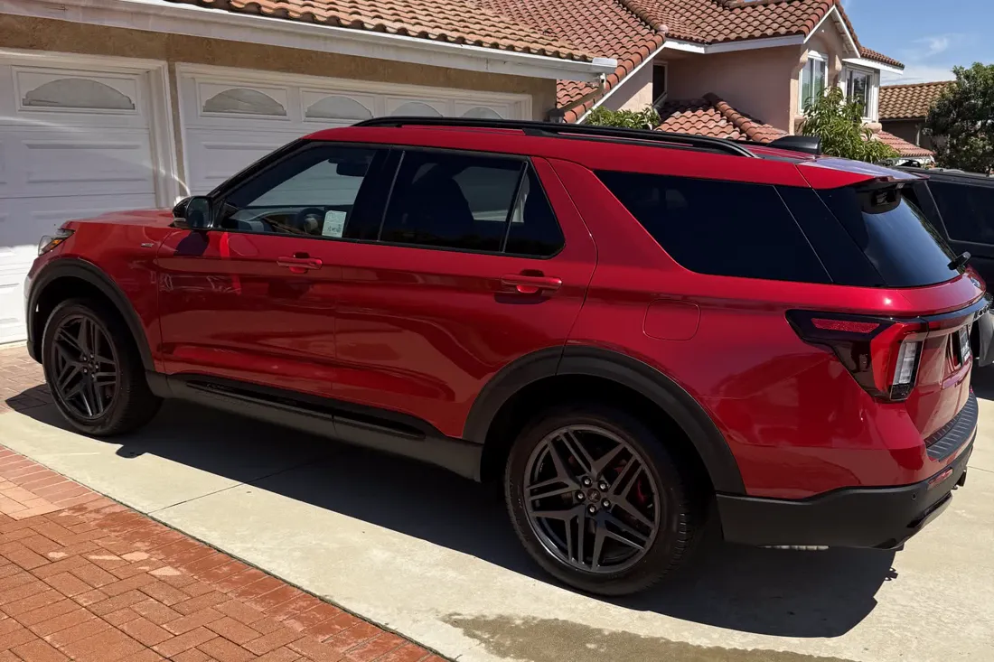 Red Ford Explorer after paint decontamination and a ceramic coating